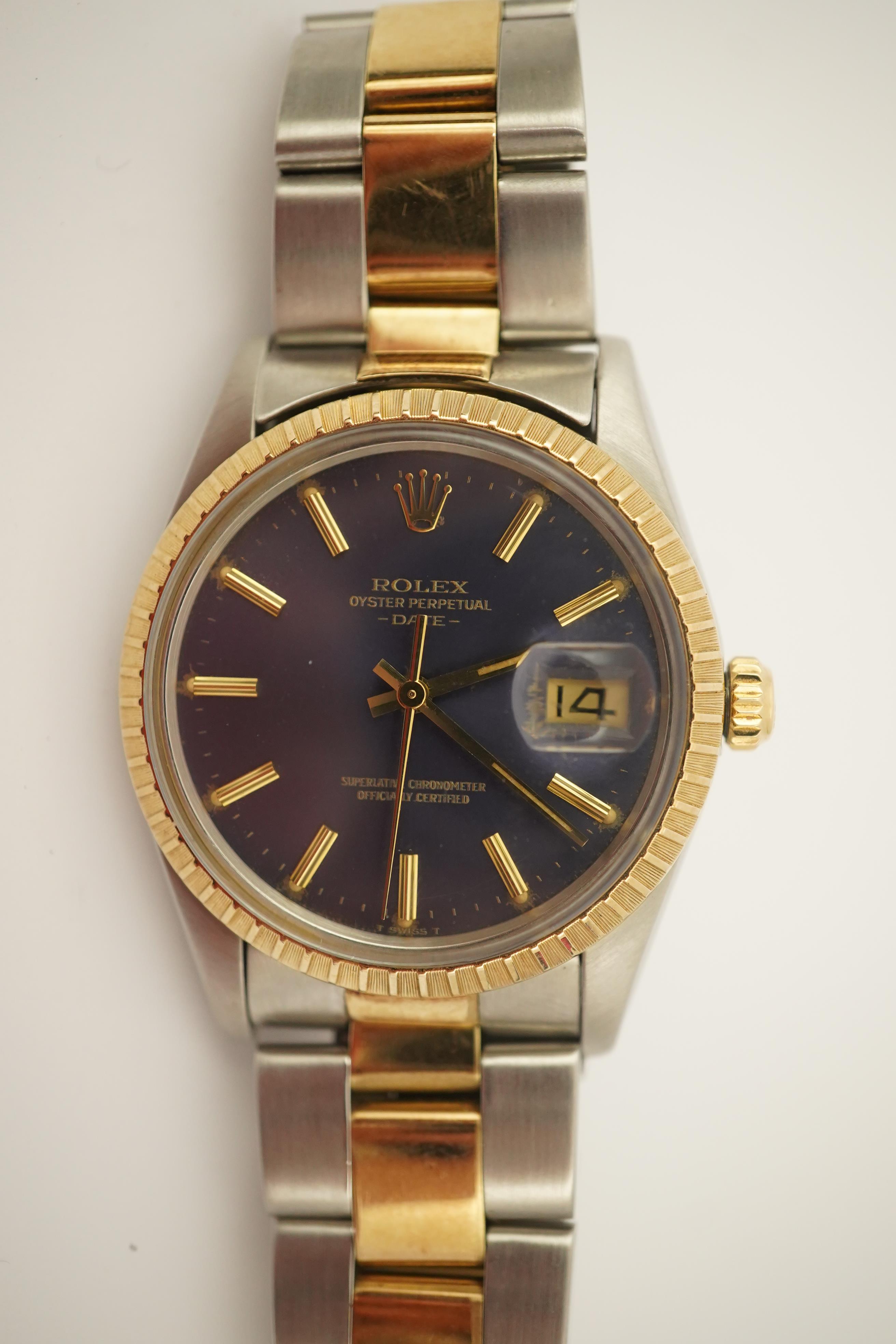 A gentleman's early 1980's stainless steel and gold Rolex Oyster Perpetual Date wrist watch, on a steel and gold Rolex bracelet